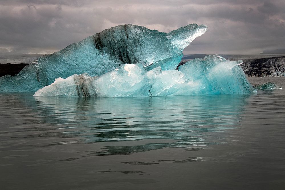 Icebergs from the Jokulsarlon glacier adrift in Jokulsarlon lagoon in Iceland art print by Steve Mohlenkamp for $57.95 CAD